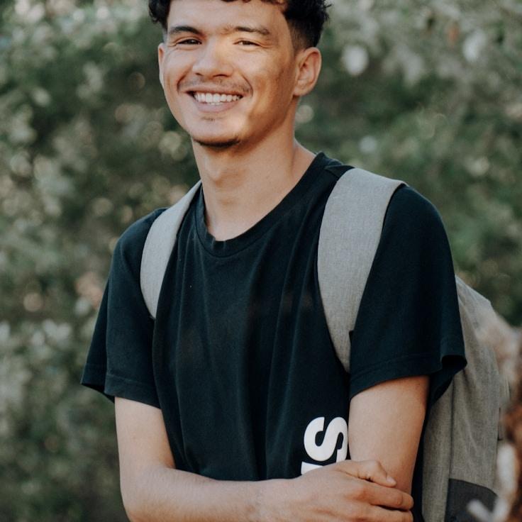 Portrait of Riley Chen, group coordinator and fusion cooking expert